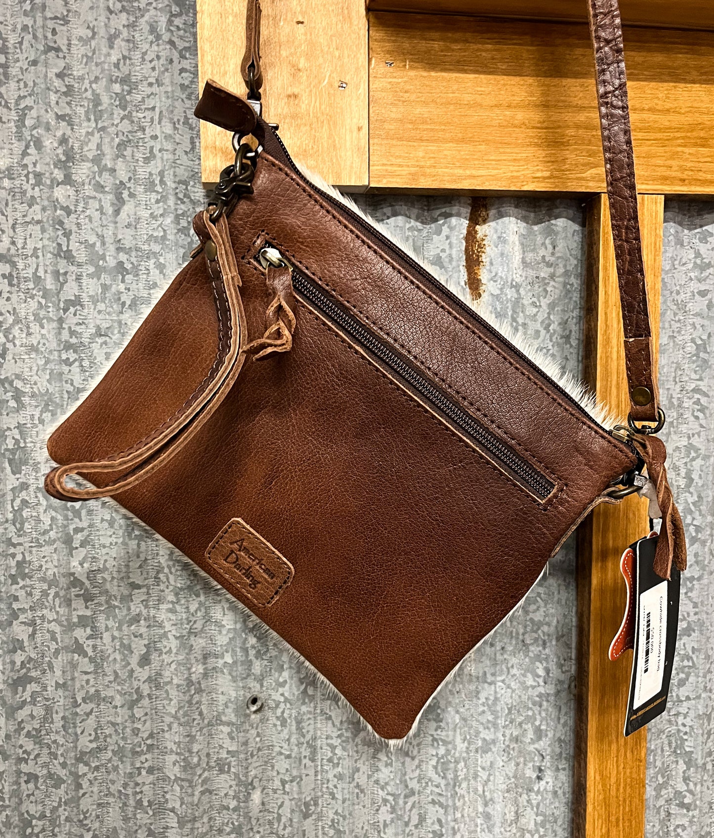 Cowhide crossbody bag.
